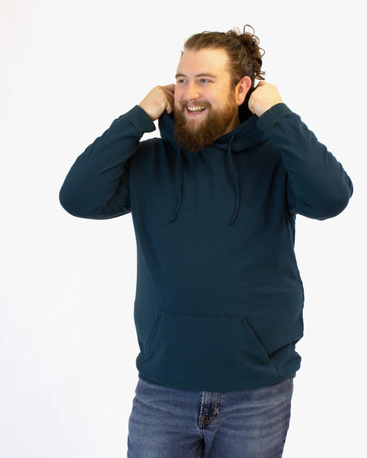 picture of person wearing a drawstring hoodie with kangeroo pocket pulling up hood