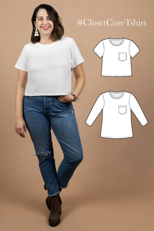Woman wearing a white t-shirt and blue jeans with '#ClosetCoreTshirt' text and illustrations on a beige background.