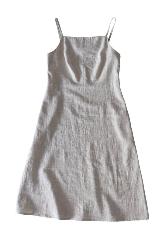 Light gray slip dress on a white background