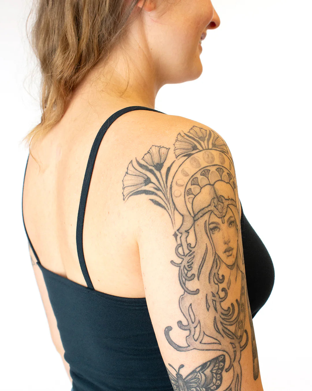 picture of side detail of the straps of person wearing knit tank