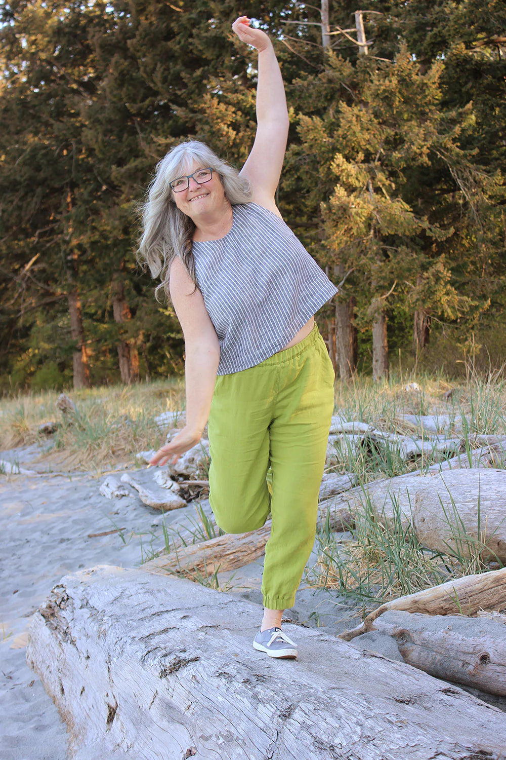 Person wearing Arden pants with cuffed pants leg