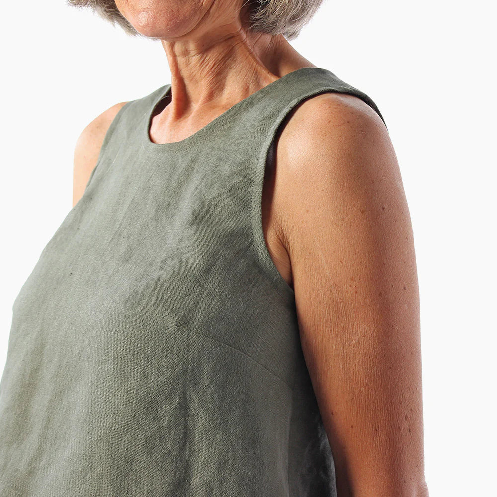 Side detail of bust dart of a person wearing a version of the Ashton top