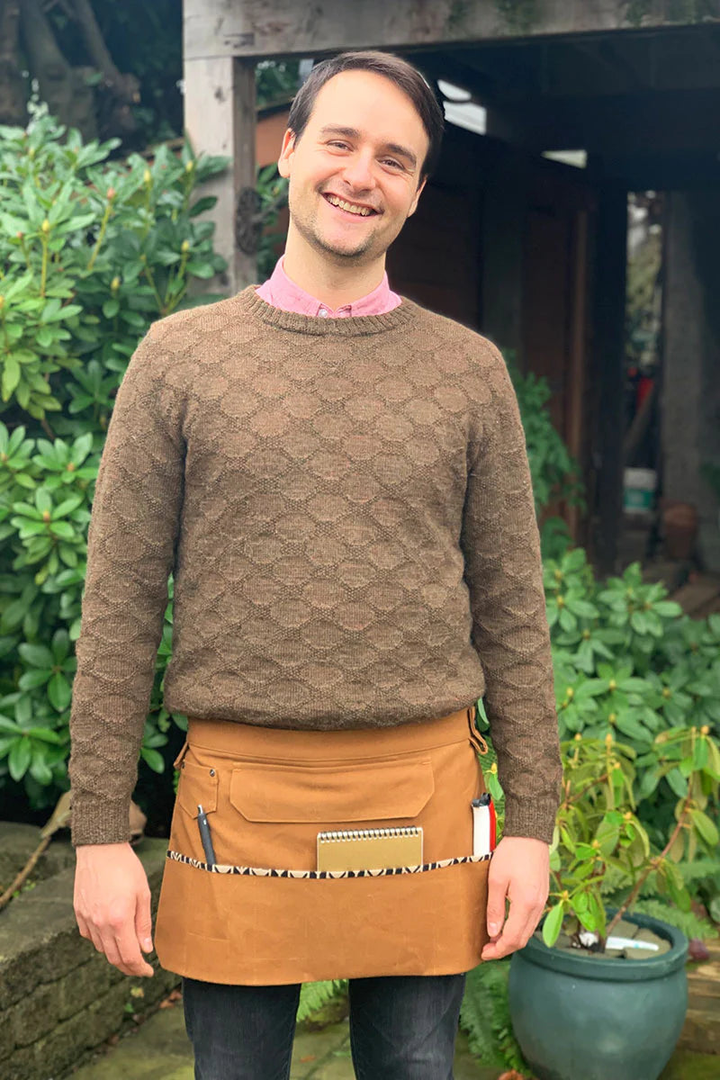 full picture of the front of a person wearing dogwood apron