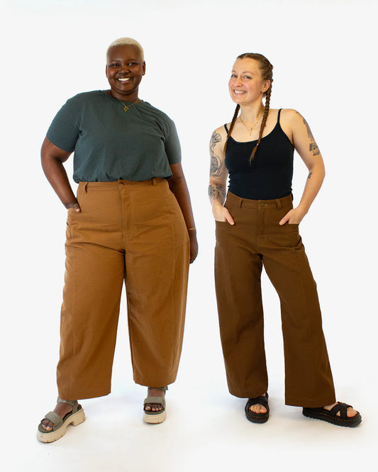 picture of two people wearing both views of falconer pants