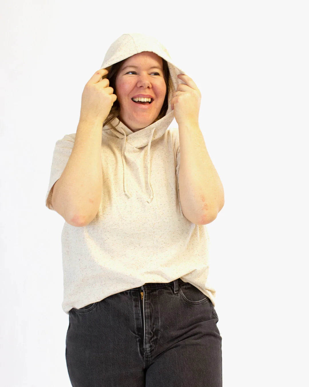 picture of person wearing a drawstring hoodie with kangeroo pocket and short sleeved