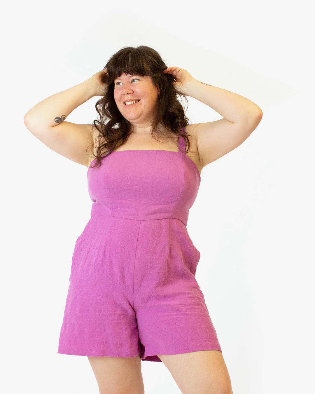 picture of a person modeling the shorts jumpsuit view of lockhart sewing pattern.