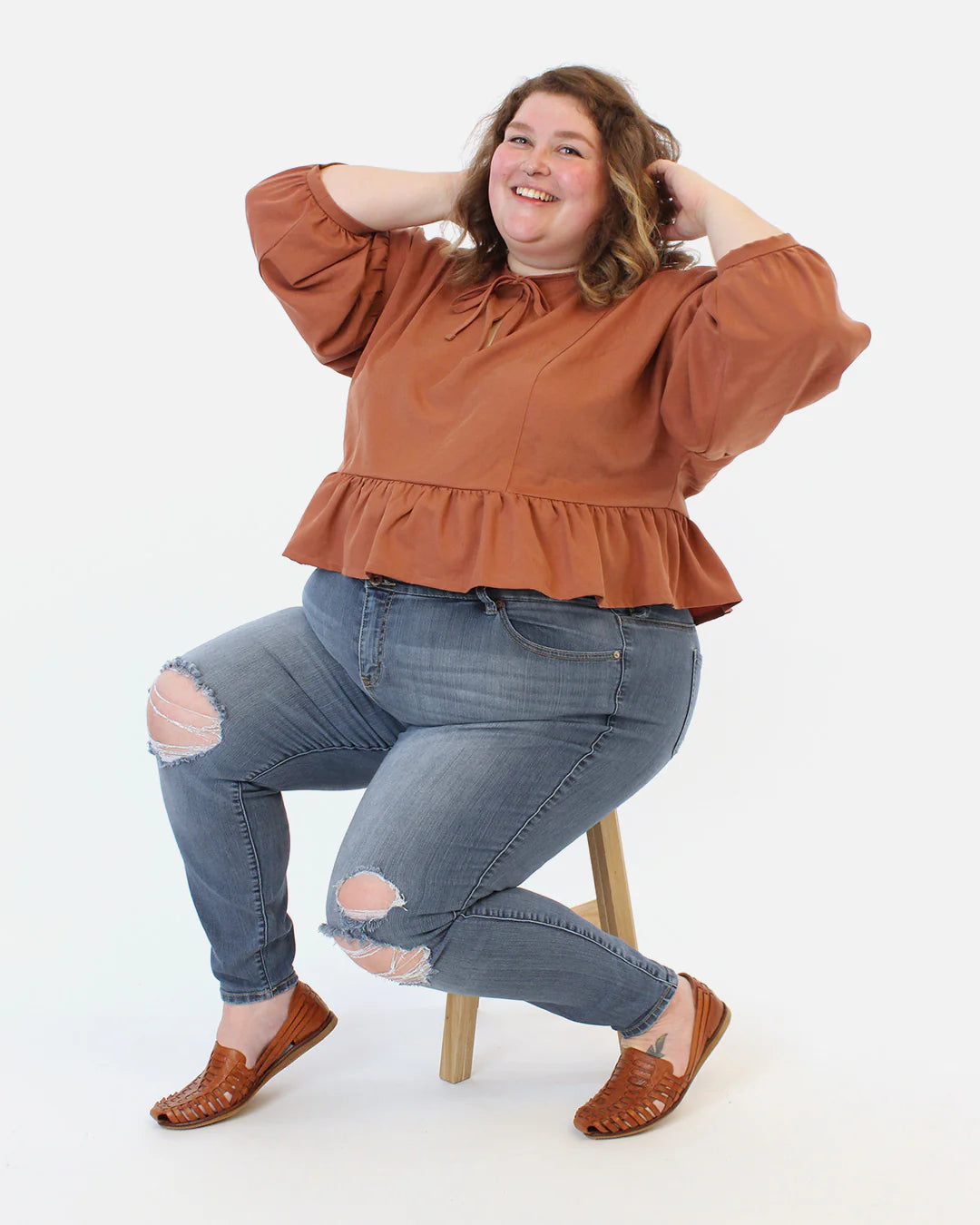 person wearing top with bottom ruffle view of march sewing pattern