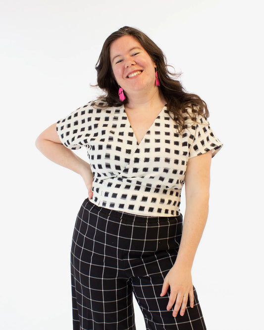 picture of woman wearing short sleeve wrap cassidy shirt 