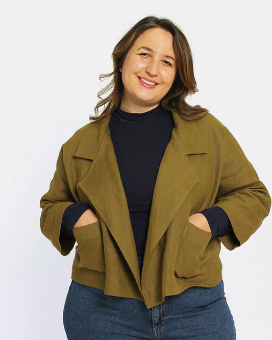 picture of a woman wearing a cropped jacket with pockets