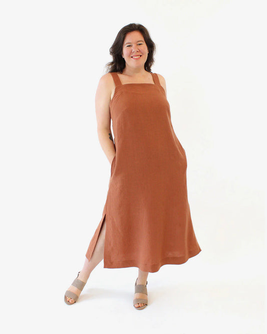 picture of person wearing orange long view with slit of the reynolds dress