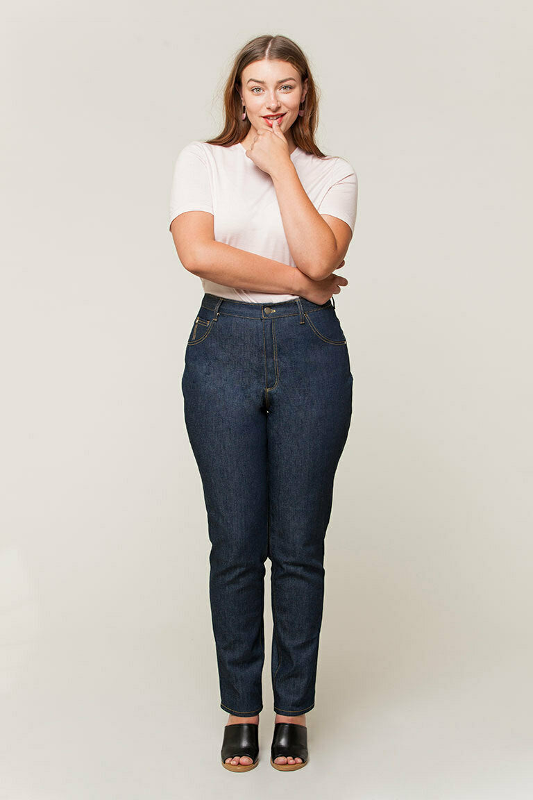 picture of woman wearing fitted jeans and a white tee