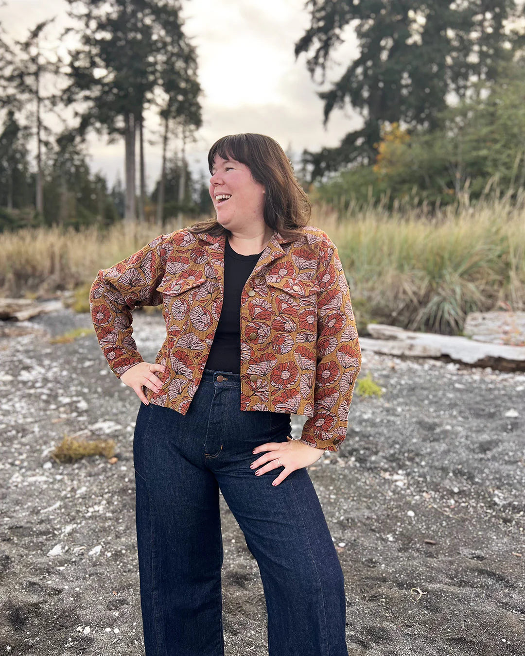 picture of woman wearing a cropped printed denim jacket
