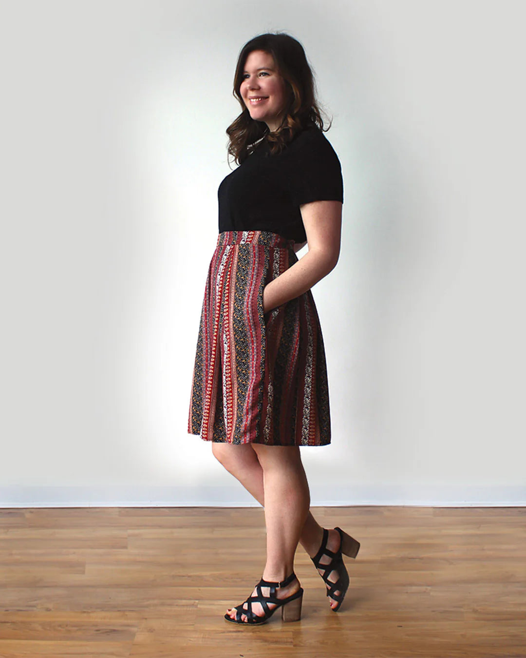 woman wearing red printed midi length culottes