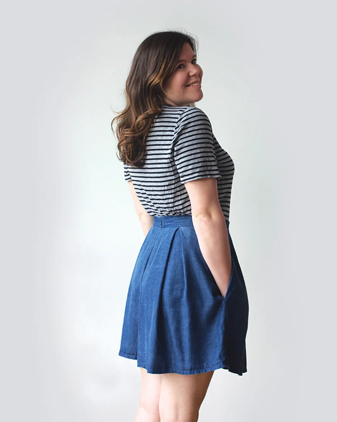 woman wearing denim mini length culottes