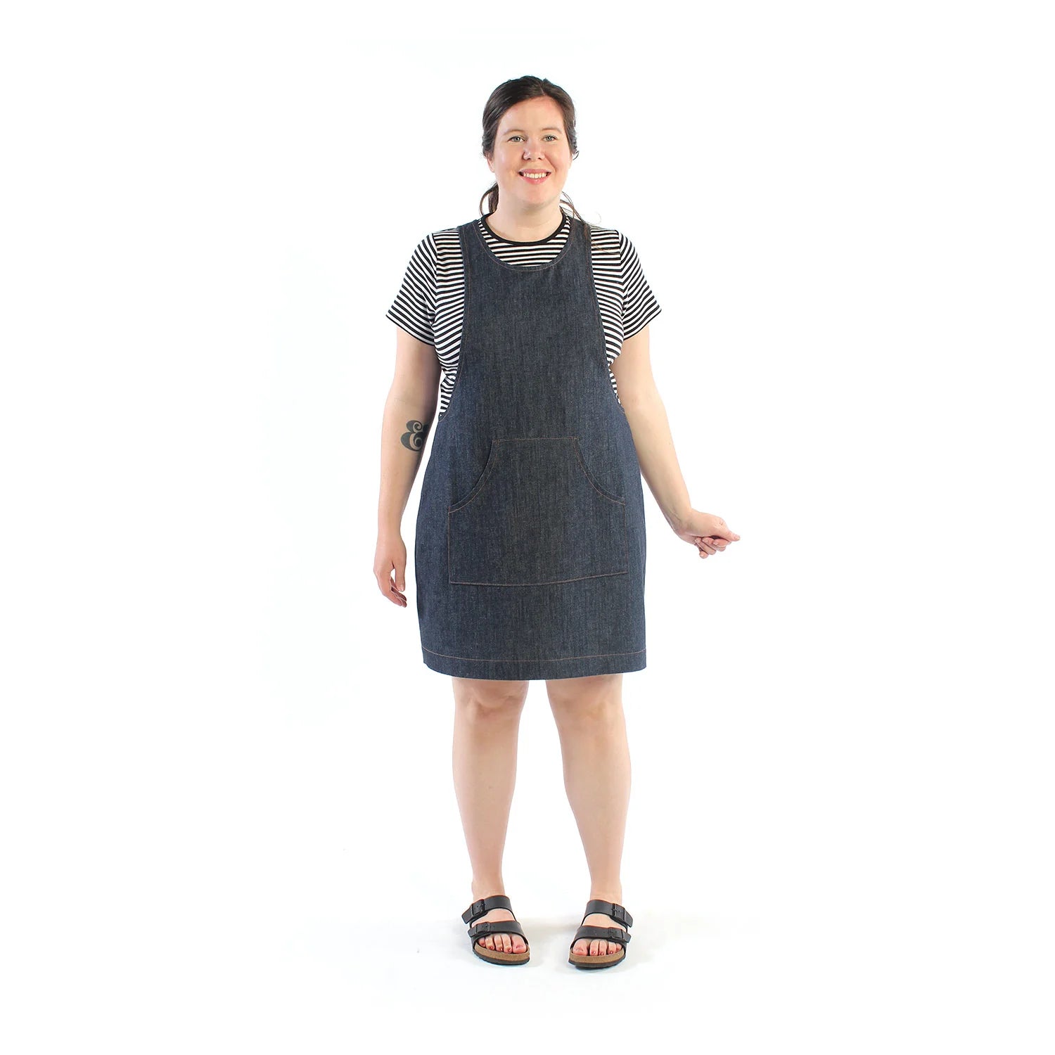picture of woman wearing a denim pinafore with kangaroo pocket