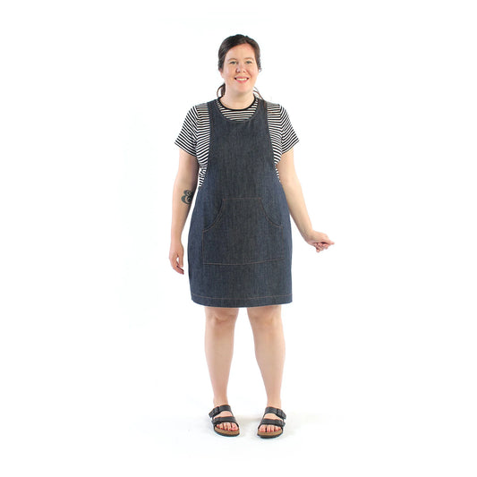picture of woman wearing a denim pinafore with kangaroo pocket